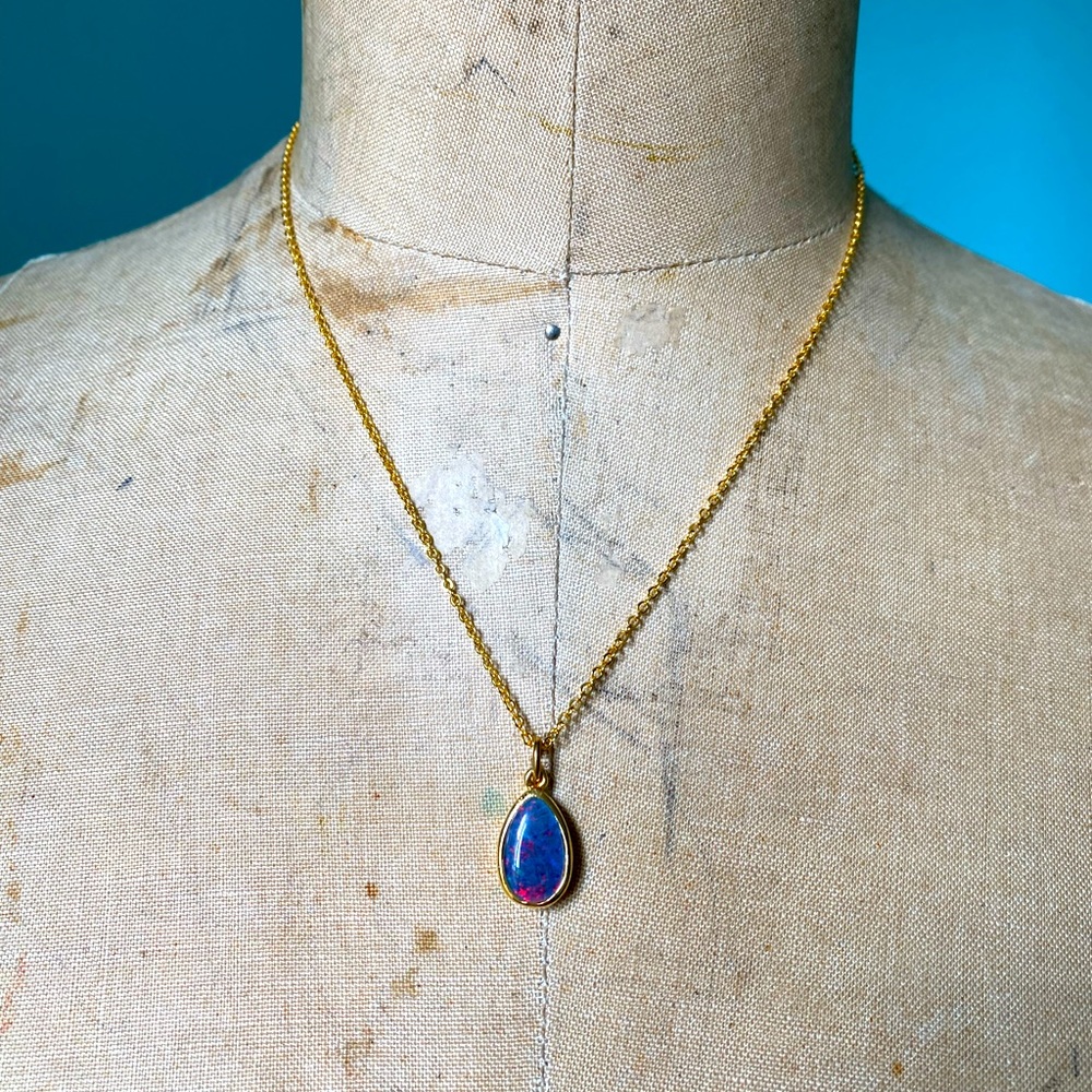 Never worn opal charm on faux gold chain necklace / costume jewelry